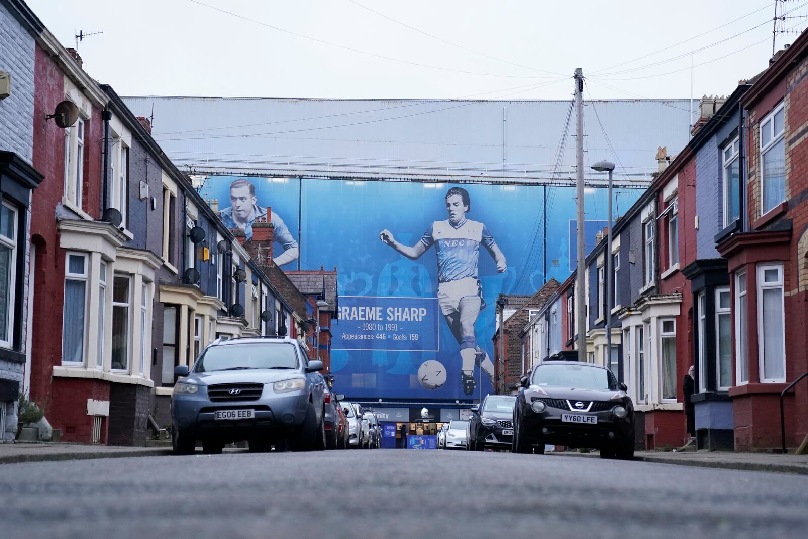 Cars are parking outside of the of Goodison Park stadium ahead of the English Premier League soccer match between Everton and Liverpool, Liverpool, England, Wednesday, Feb.12, 2025. (AP Photo/Dave Thompson)