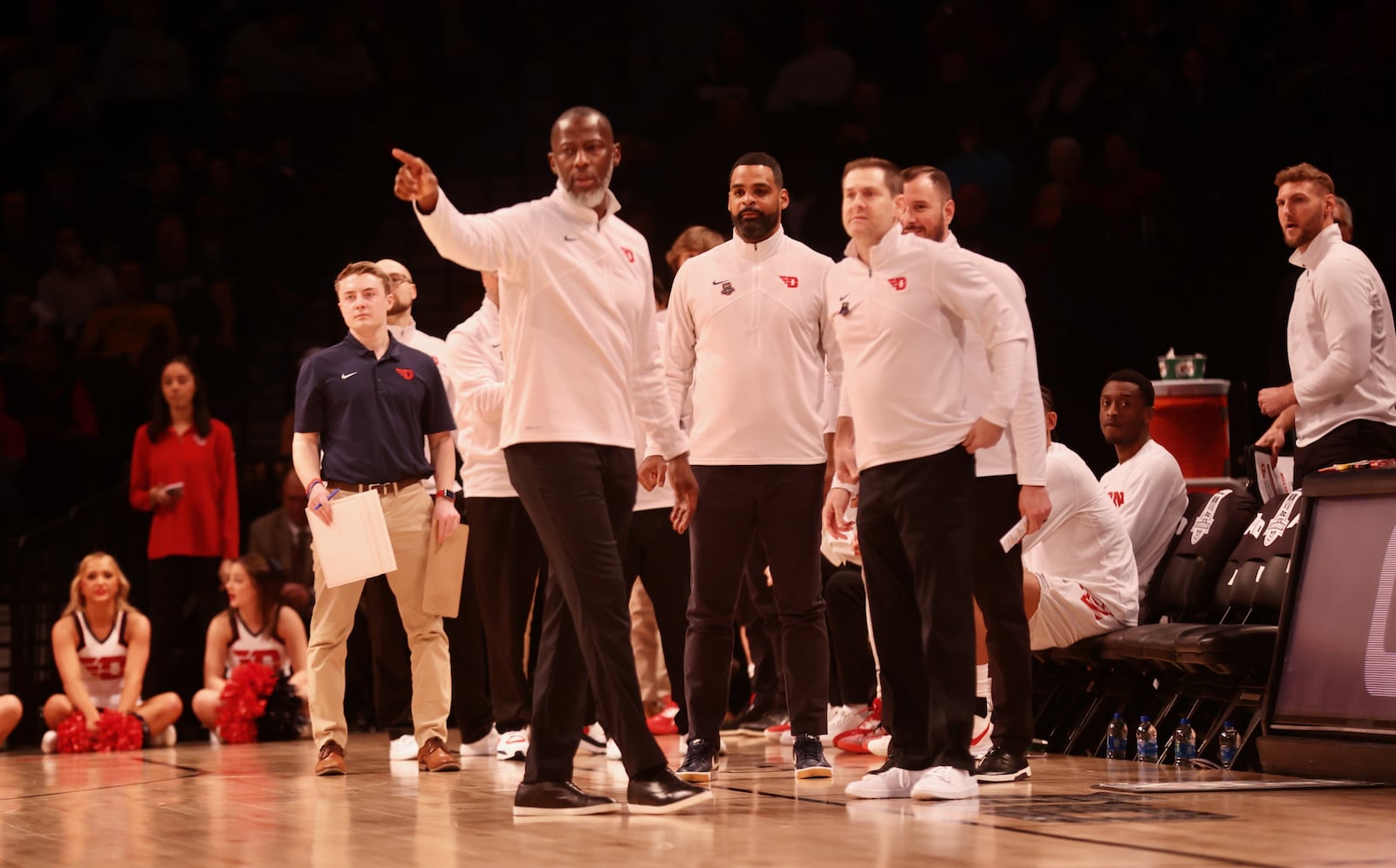 Dayton's Anthony Grant and his staff coaches during a game against Fordham in the semifinals of the Atlantic 10 Conference tournament on Saturday, March 11, 2023, at the Barclays Center in Brooklyn, N.Y. David Jablonski/Staff