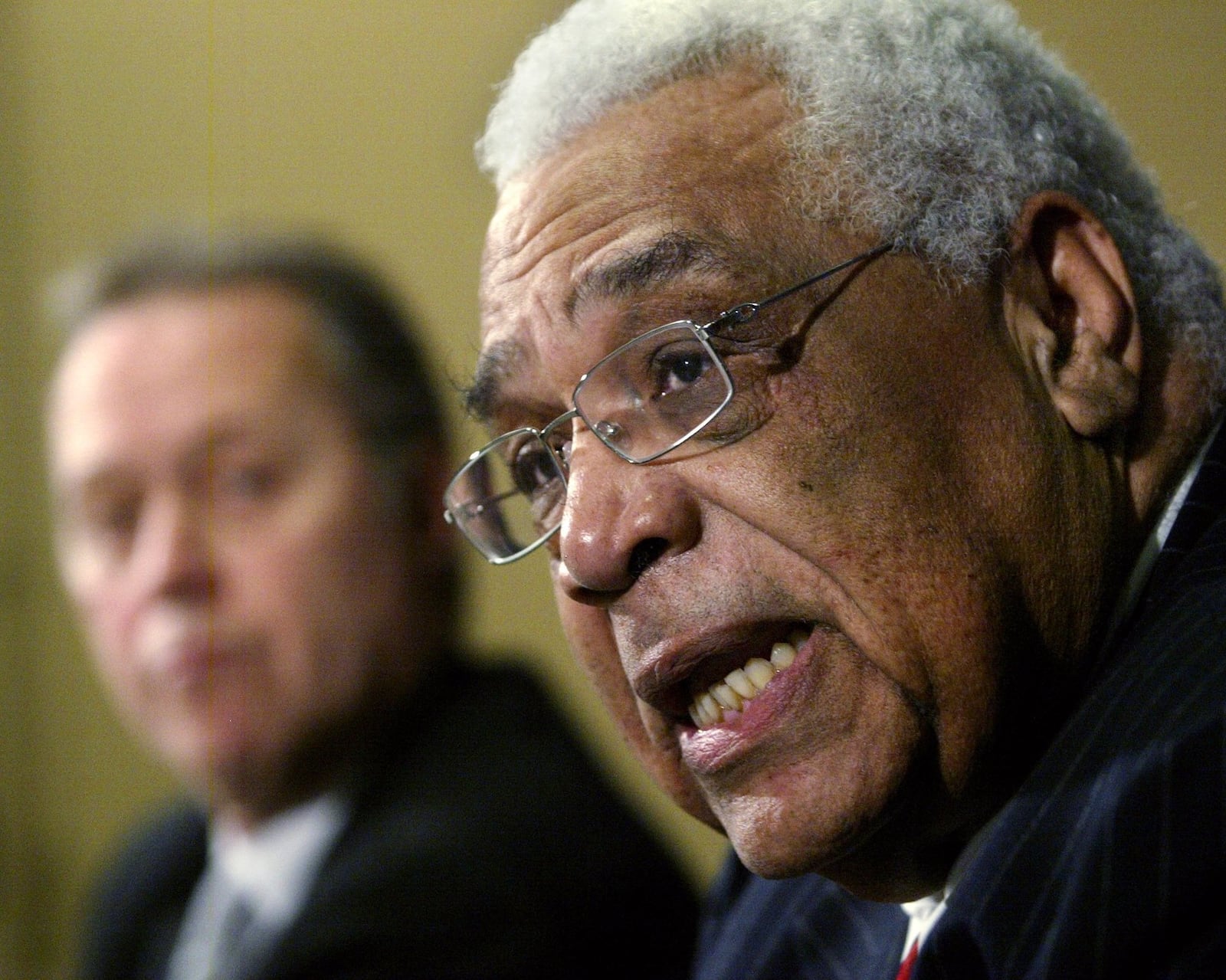 Toronto Raptors new interim General Manager Wayne Embry, right, talks with the media after CEO of Toronto Maple Leafs Sports and Entertainment, Richard Peddie, left, announced that Toronto Raptors General Manager Rob Babcock has been relieved of his duties effective immediately on Thursday, Jan. 26, 2005 during a press conference in Toronto. (AP Photo/ Nathan Denette, CP)