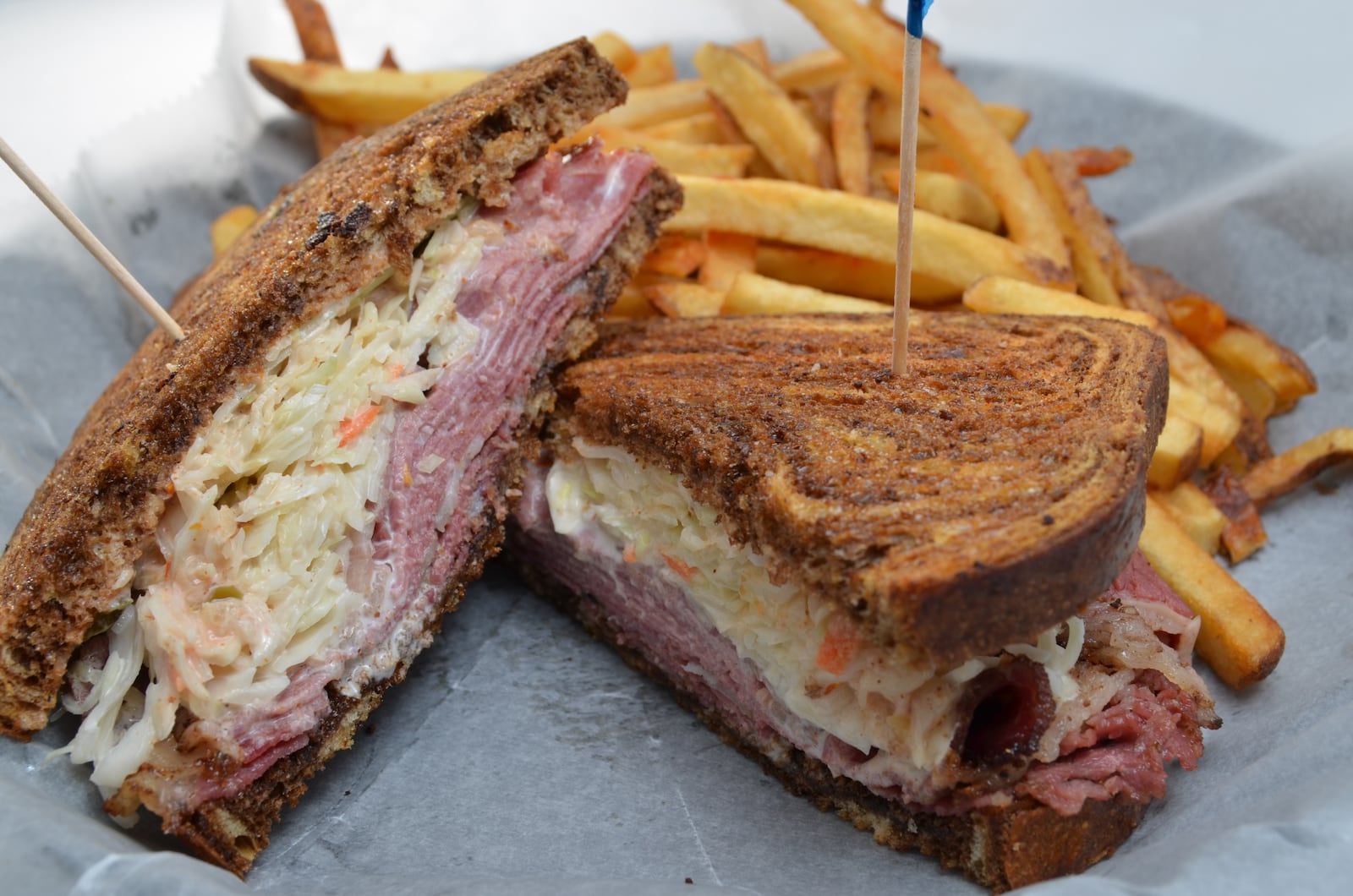 The Ladder 11 at Jimmie’s Ladder 11 consists of hand-cut pastrami and corned beef grilled with homemade slaw and Russian dressing on a toasted hoagie bun or rye.  View the full list of 9 must-eat sandwiches on Dayton.com »