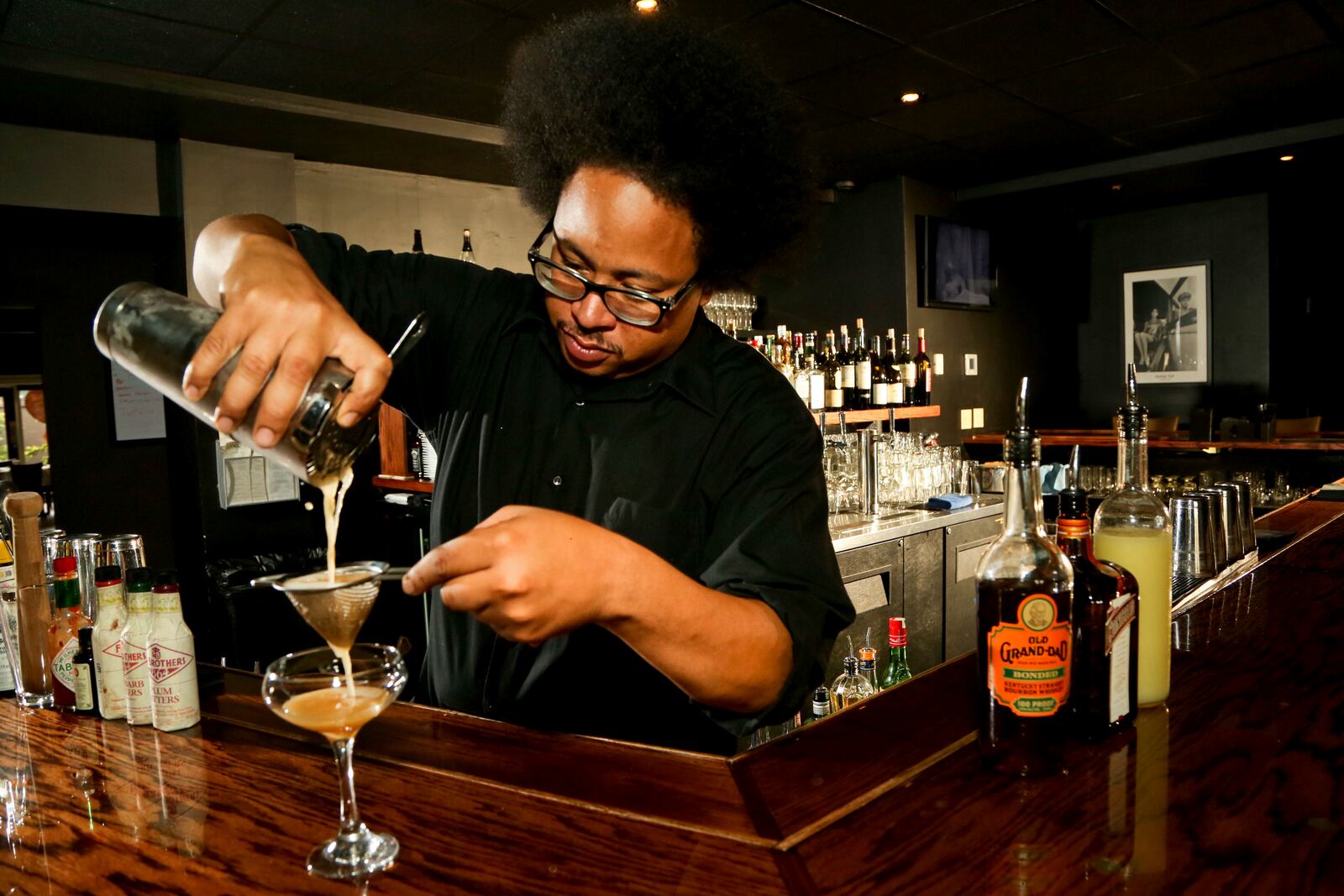 CoCo's Sweater Weather cocktail being made by bartender Nick Hunt. JIM WITMER/STAFF