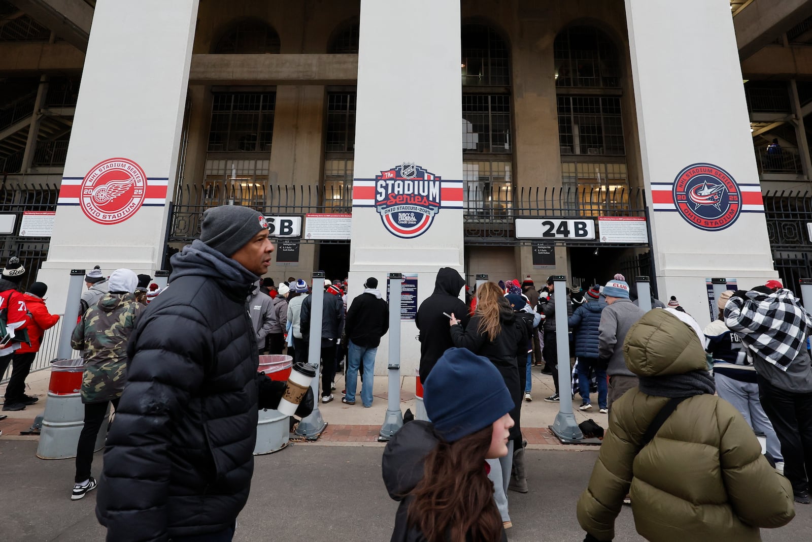 Fans enter Ohio Stadium before the start of the Stadium Series NHL hockey game between the Columbus Blue Jackets and the Detroit Red Wings Saturday, March 1, 2025, in Columbus, Ohio. (AP Photo/Jay LaPrete)