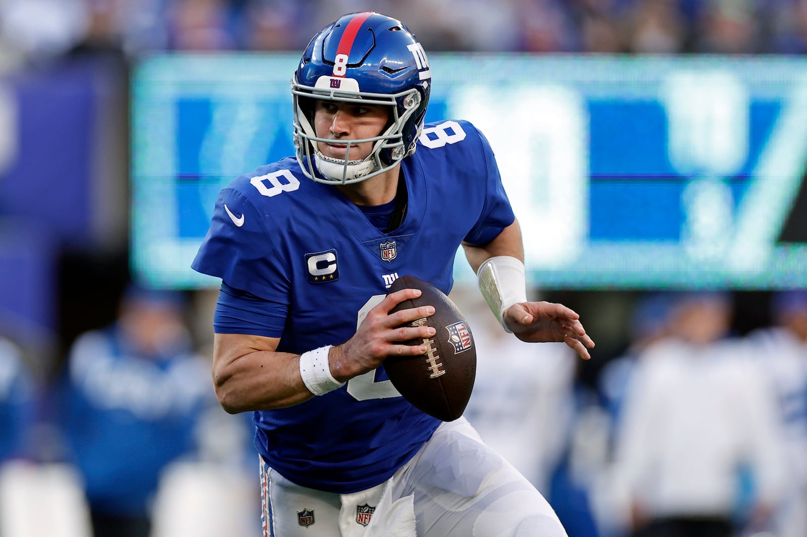 FILE - New York Giants quarterback Daniel Jones runs with the ball against the Indianapolis Colts during an NFL football game, Jan. 1, 2023, in East Rutherford, N.J. (AP Photo/Adam Hunger, file)