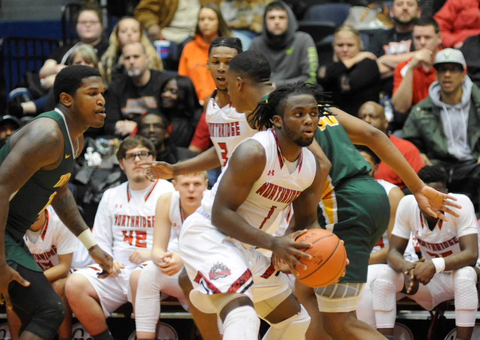 Twon Hines (with ball) made to free throws to win it for Northridge. MARC PENDLETON / STAFF