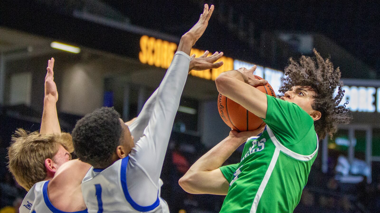 Chaminade Julienne senior George Washington III gets off a shot against Cincinnati Wyoming during Sunday's Division II district final at the Cintas Center. CONTRIBUTED/Jeff Gilbert