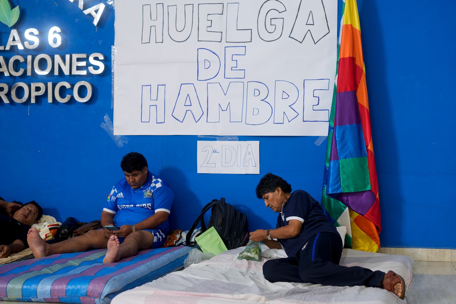 Former Bolivia's President Evo Morales, right, chews coca during a hunger strike in Lauca N, in the Chapare region, Bolivia, Sunday, Nov. 3, 2024, amid an ongoing political conflict with the government of President Luis Arce.(AP Photo/Juan Karita)