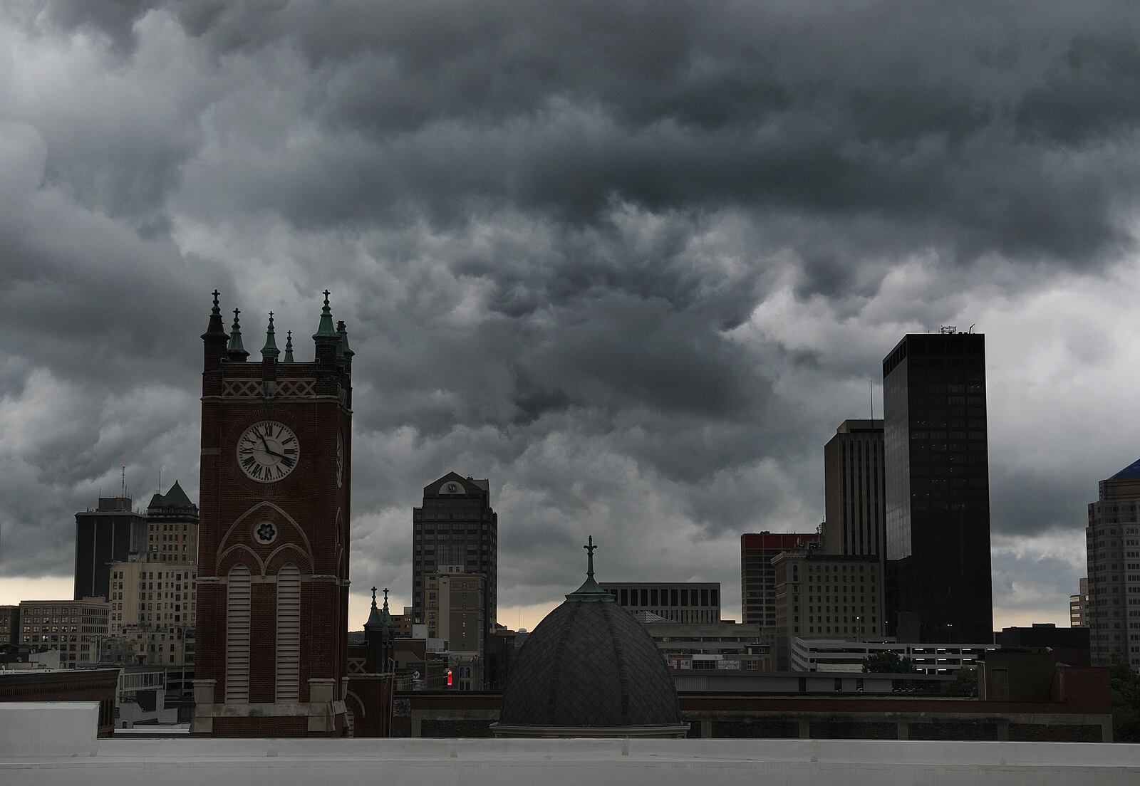 Storm clouds move over downtown Dayton, Wednesday, July 6, 2022. MARSHALL GORBY\STAFF