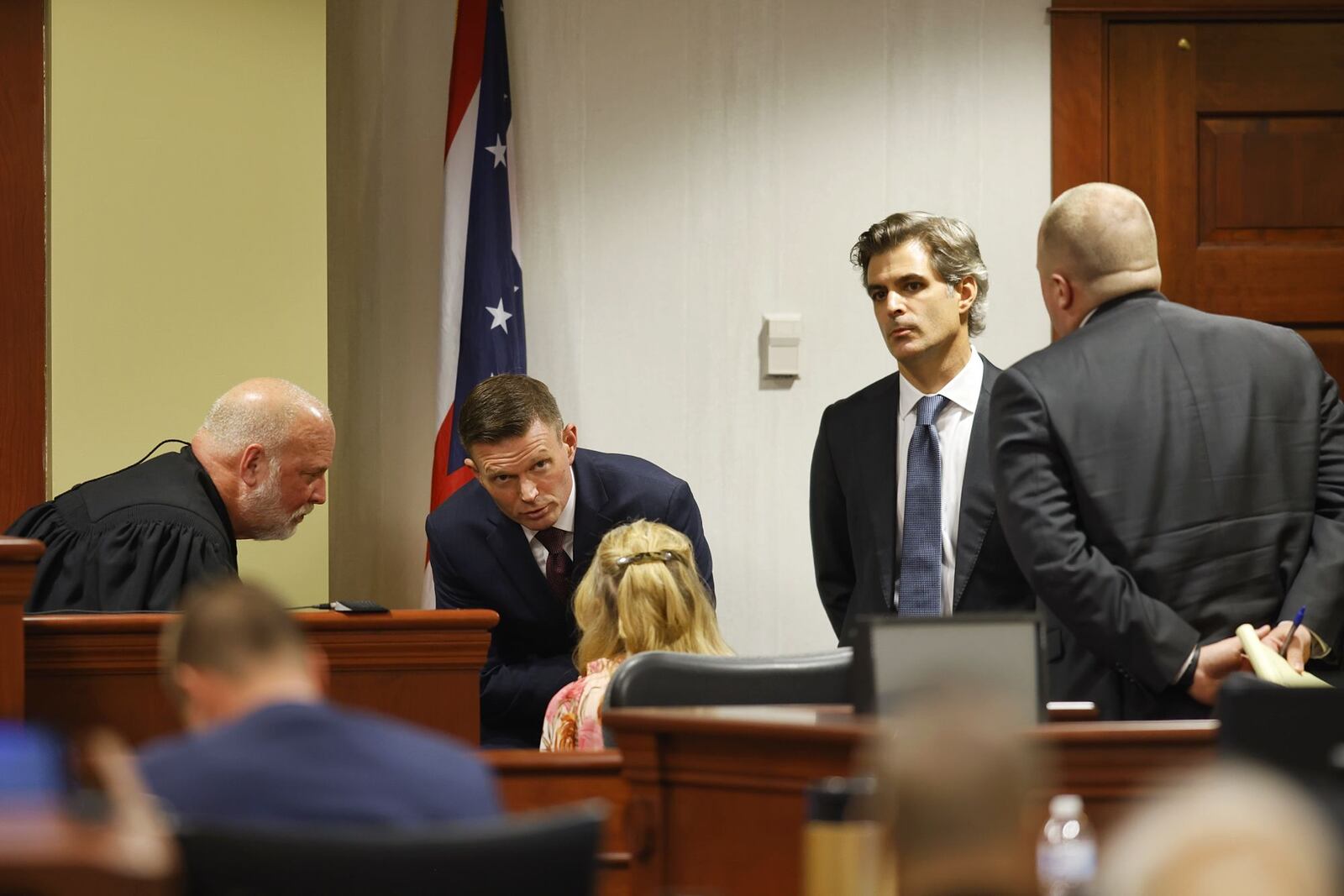 Attorneys and Judge Greg Howard Wednesday during a sidebar in the Gurpreet Singh death penalty trial. NICK GRAHAM/STAFF