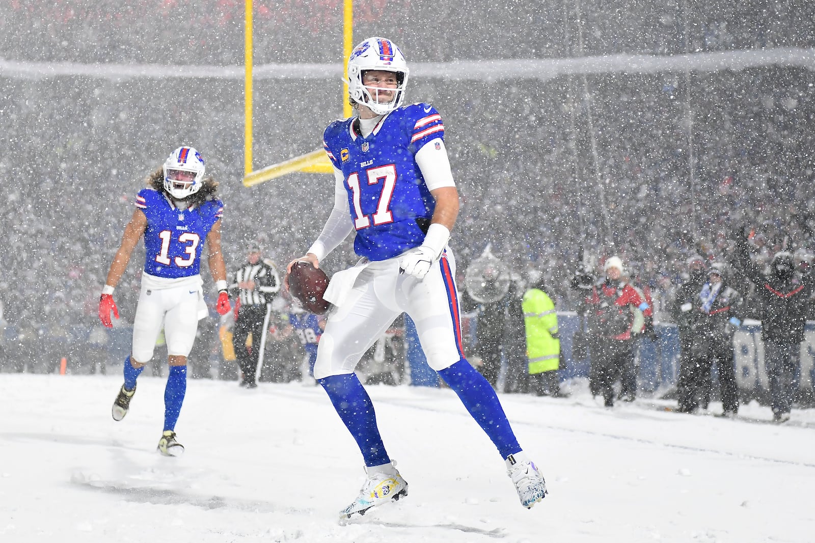 Buffalo Bills quarterback Josh Allen (17) celebrates after scoring against the San Francisco 49ers during the second half of an NFL football game in Orchard Park, N.Y., Sunday, Dec. 1, 2024. (AP Photo/Adrian Kraus)