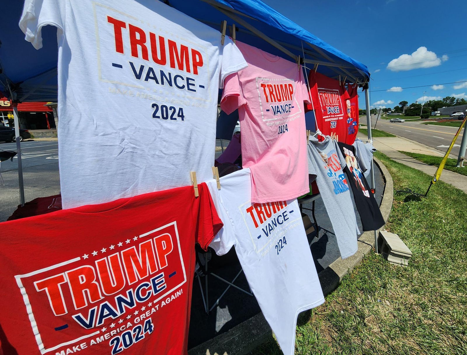 Shirts promoting former President Donald Trump and his running mate, U.S. Sen. JD Vance, a Middletown High School graduate, are for sale now at tent sites in Middletown. This image was taken Thursday, July 18, 2024, after Vance delivered his acceptance speech for the vice presidential nomination. NICK GRAHAM/STAFF