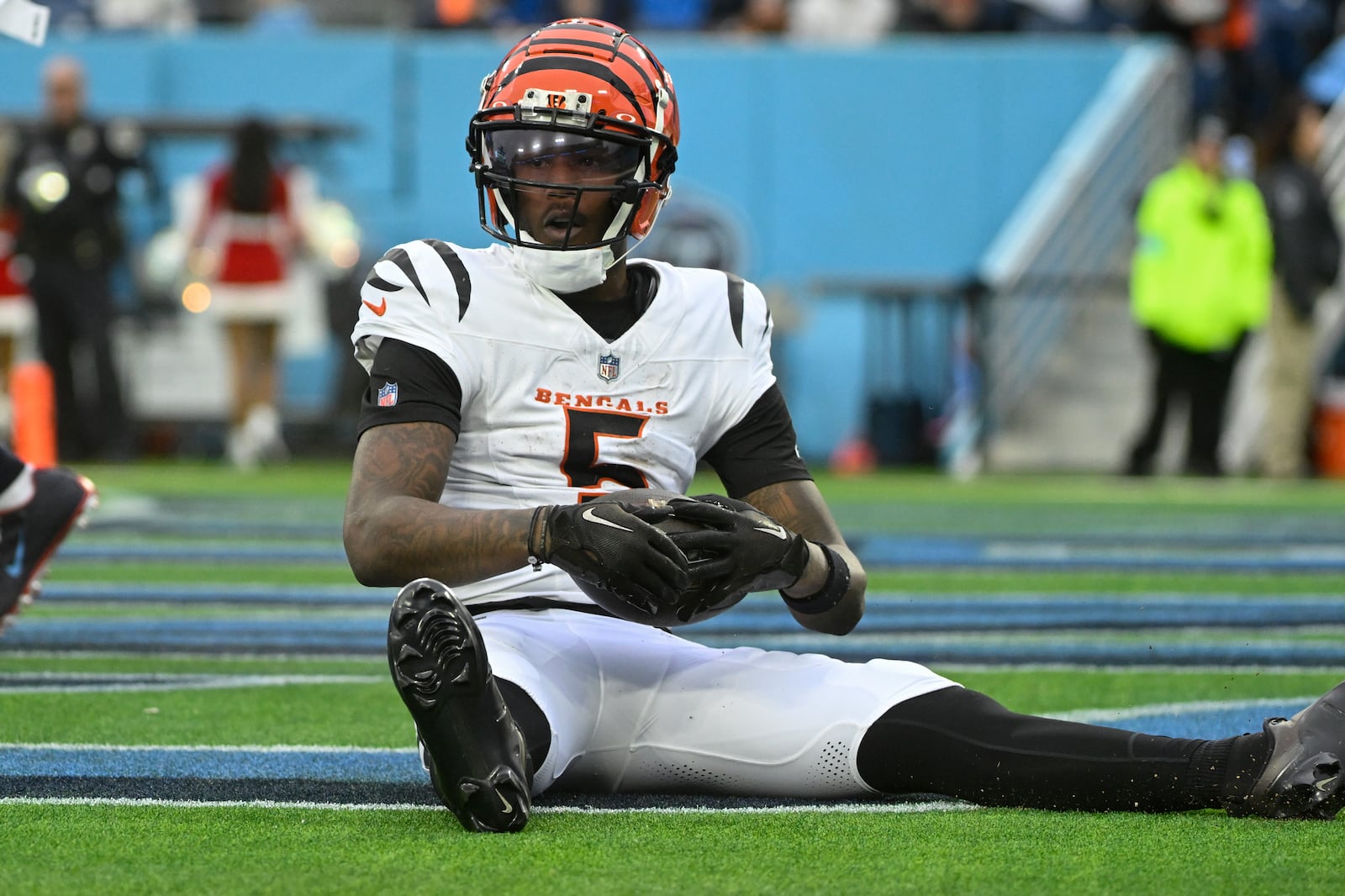 Cincinnati Bengals wide receiver Tee Higgins (5) reacts in the endzone after scoring a touchdown during the first half of an NFL football game against the Tennessee Titans, Sunday, Dec. 15, 2024, in Nashville, Tenn. (AP Photo/John Amis)