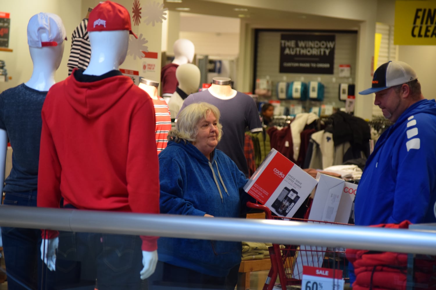 PHOTOS: Hundreds like up outside JCPenney for doorbusters, coupons