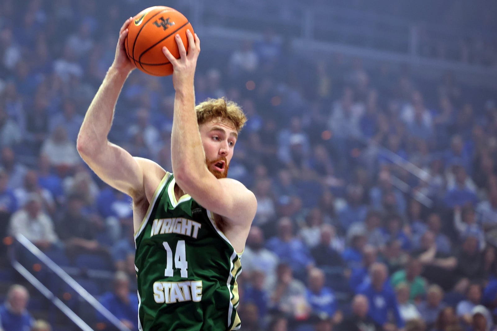 Wright State's Brandon Noel pulls down a rebound during the first half of an NCAA college basketball game against Kentucky in Lexington, Ky., Monday, Nov. 4, 2024. (AP Photo/James Crisp)