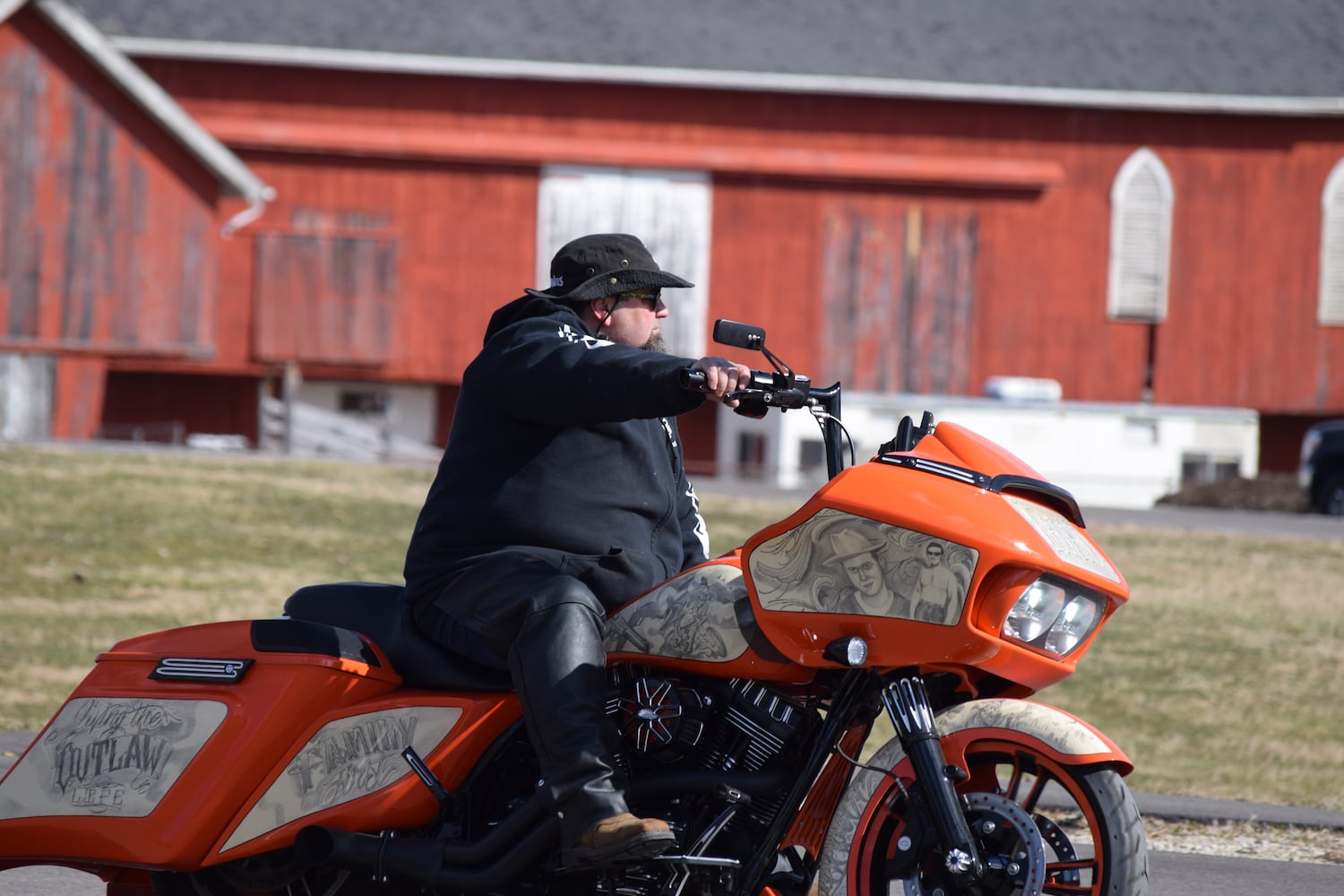 PHOTOS: Thousands of Outlaws attend motorcycle gang leaders funeral at Montgomery County Fairgrounds.