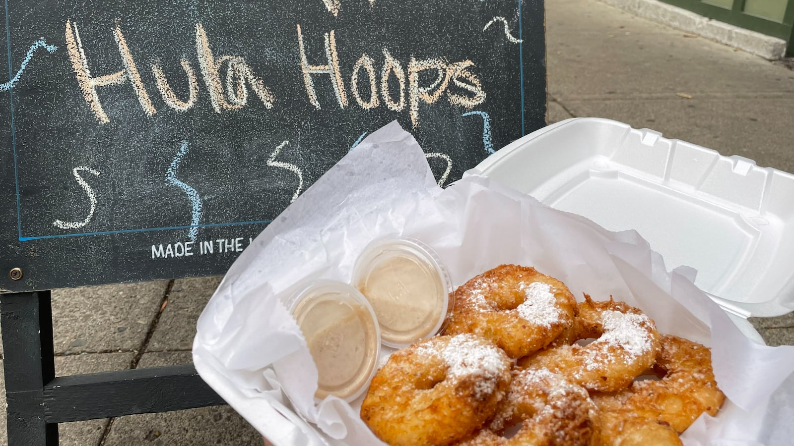 Blind Bob's, a family-owned tavern in Dayton’s Oregon District, has several unique appetizers and dishes customers can't get anywhere else. This includes hula hoops (pictured), which are beer battered, pineapple rings.