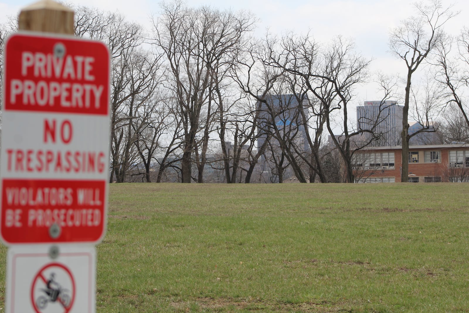 A real estate development firm proposes building about 260 new apartments on vacant land north of Homewood Avenue on the former Julienne High School site in the Five Oaks neighborhood in Dayton. CORNELIUS FROLIK / STAFF