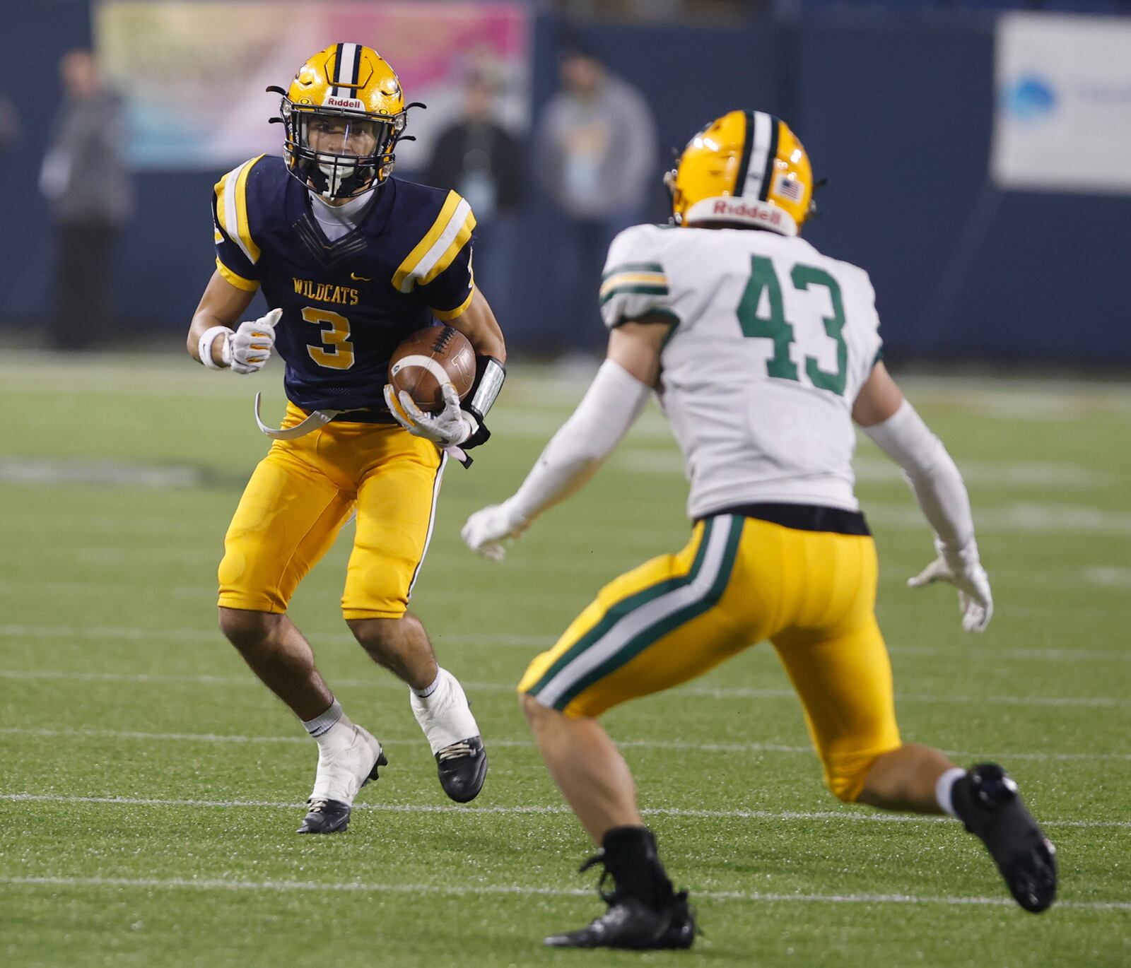 Springfield's Duncan Bradley looks for some running room after catching a pass against St. Eds Friday, Dec. 1, 2023. BILL LACKEY/STAFF