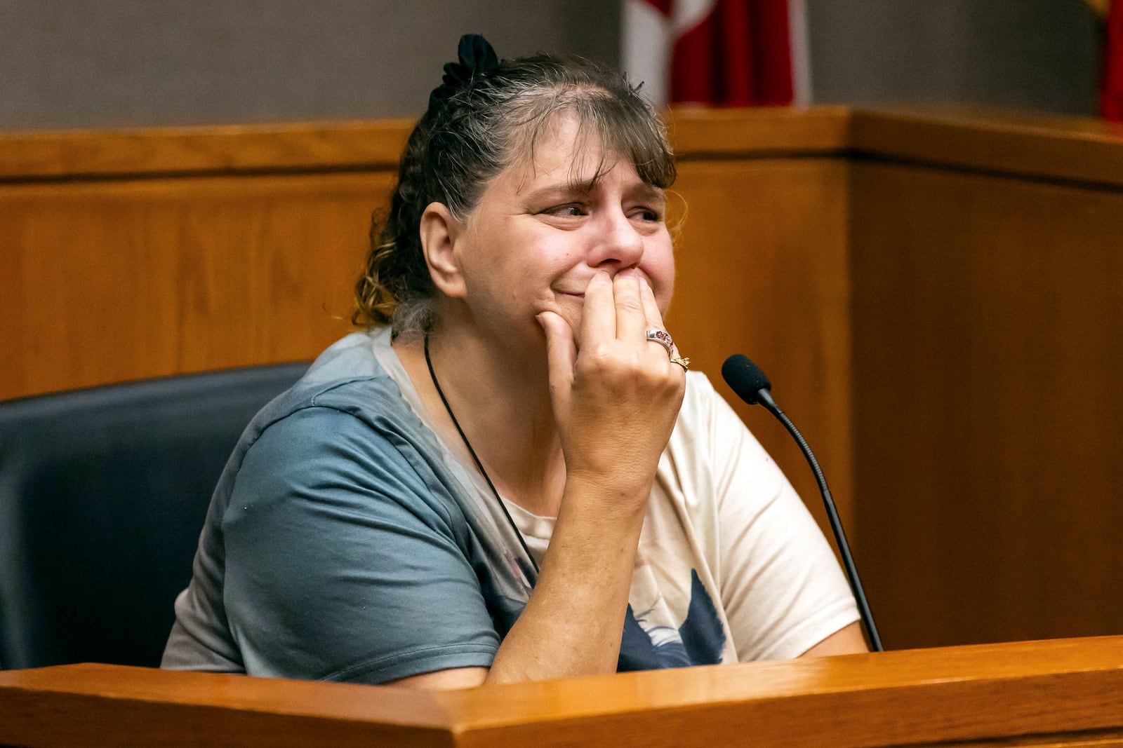 Ellyn Lorincz, sister of defendant Susan Lorincz, who fatally shot a Black neighbor through her front door during an ongoing dispute, testifies as a character witness during Susan's sentencing hearing Monday, Nov. 25, 2024, in Ocala, Fla. (Doug Engle/Ocala Star-Banner via AP, Pool)