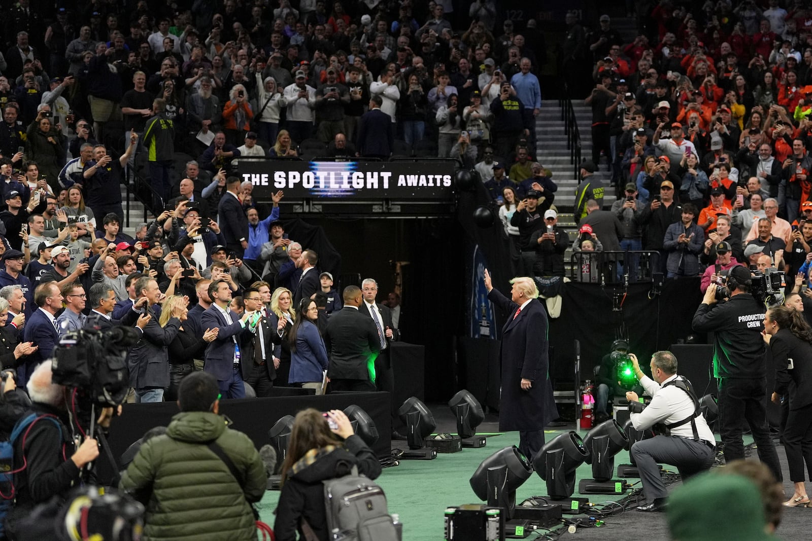 President Donald Trump attends the finals at the NCAA wrestling championship, Saturday, March 22, 2025, in Philadelphia. (AP Photo/Matt Rourke)