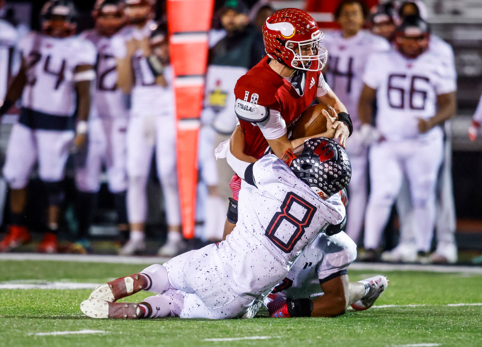 Lakota West's Cam Thomas (8) and Elijah Davis sack Princeton quarterback Deangelo Birch during their Division I regional semifinal football game Friday, Nov. 10, 2023 at Mason. Lakota West won 19-7. NICK GRAHAM/STAFF