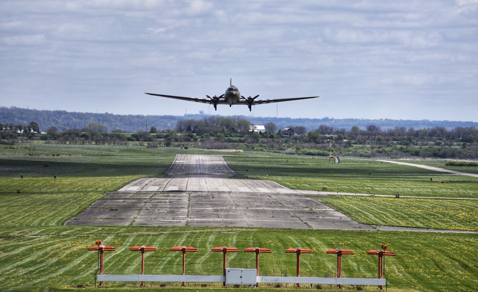 That’s All, Brother, a C-47 piloted by Lt. Col. John Donalson, arrived at Butler County Regional Airport Friday, April 16 for a three-day visit with tours and rides available. The historic WWII C-47 aircraft led over 800 C-47’s over the drop zones of Normandy, France on D-Day on June 6th, 1944. NICK GRAHAM / STAFF