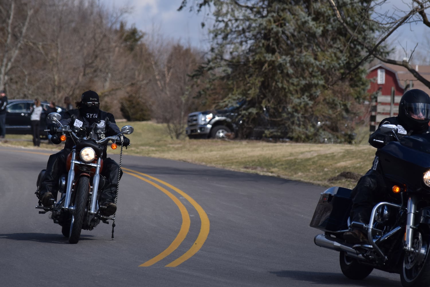 PHOTOS: Thousands of Outlaws attend motorcycle gang leaders funeral at Montgomery County Fairgrounds.