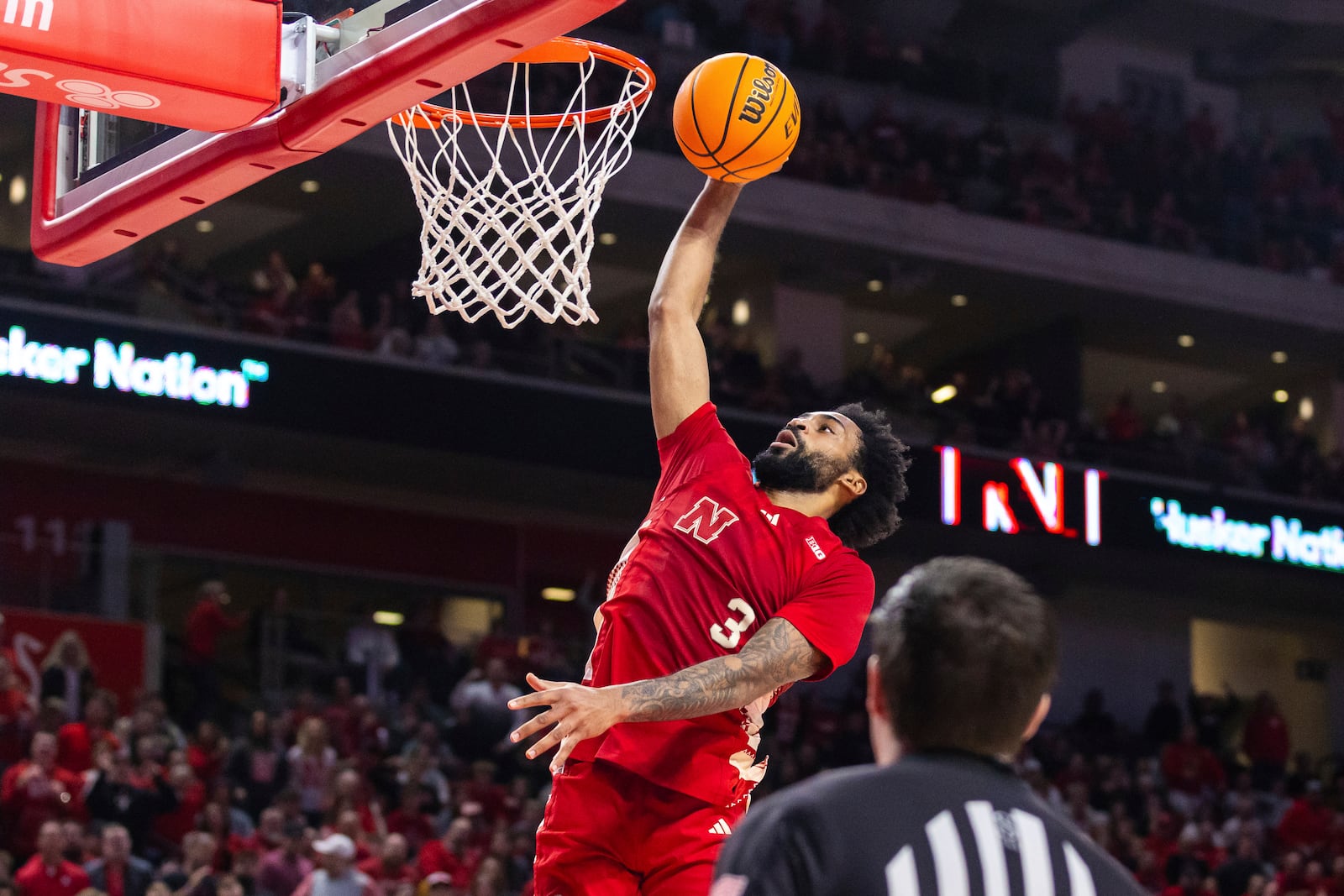 Nebraska guard Brice Williams dunks against Michigan during the first half of an NCAA college basketball game, Monday, Feb. 24, 2025, in Lincoln, Neb. (AP Photo/Bonnie Ryan)