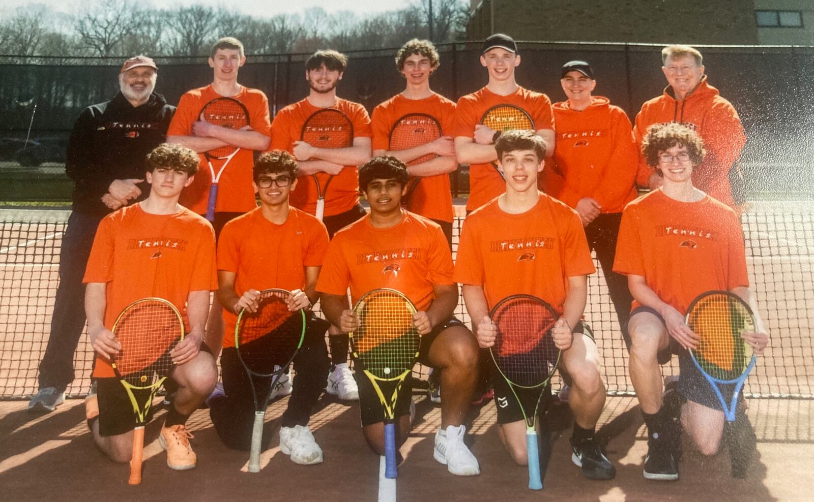 George "Brad" Hagan, top right, is pictured with the Beavercreek tennis team. Contributed photo