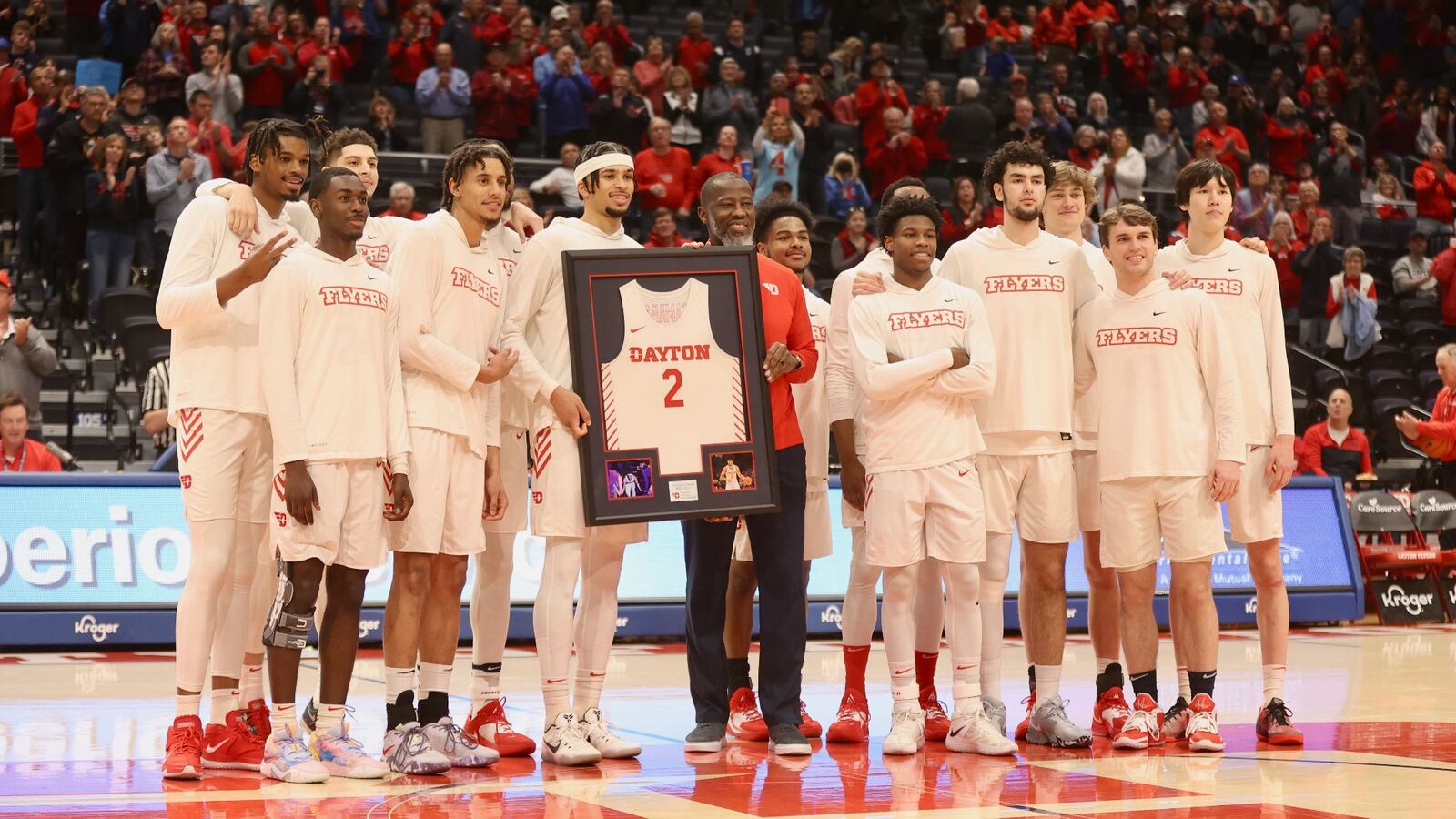 Dayton's Toumani Camara is honored on Senior Night before a game against La Salle on Tuesday, Feb. 28, 2023, at UD Arena. David Jablonski/Staff