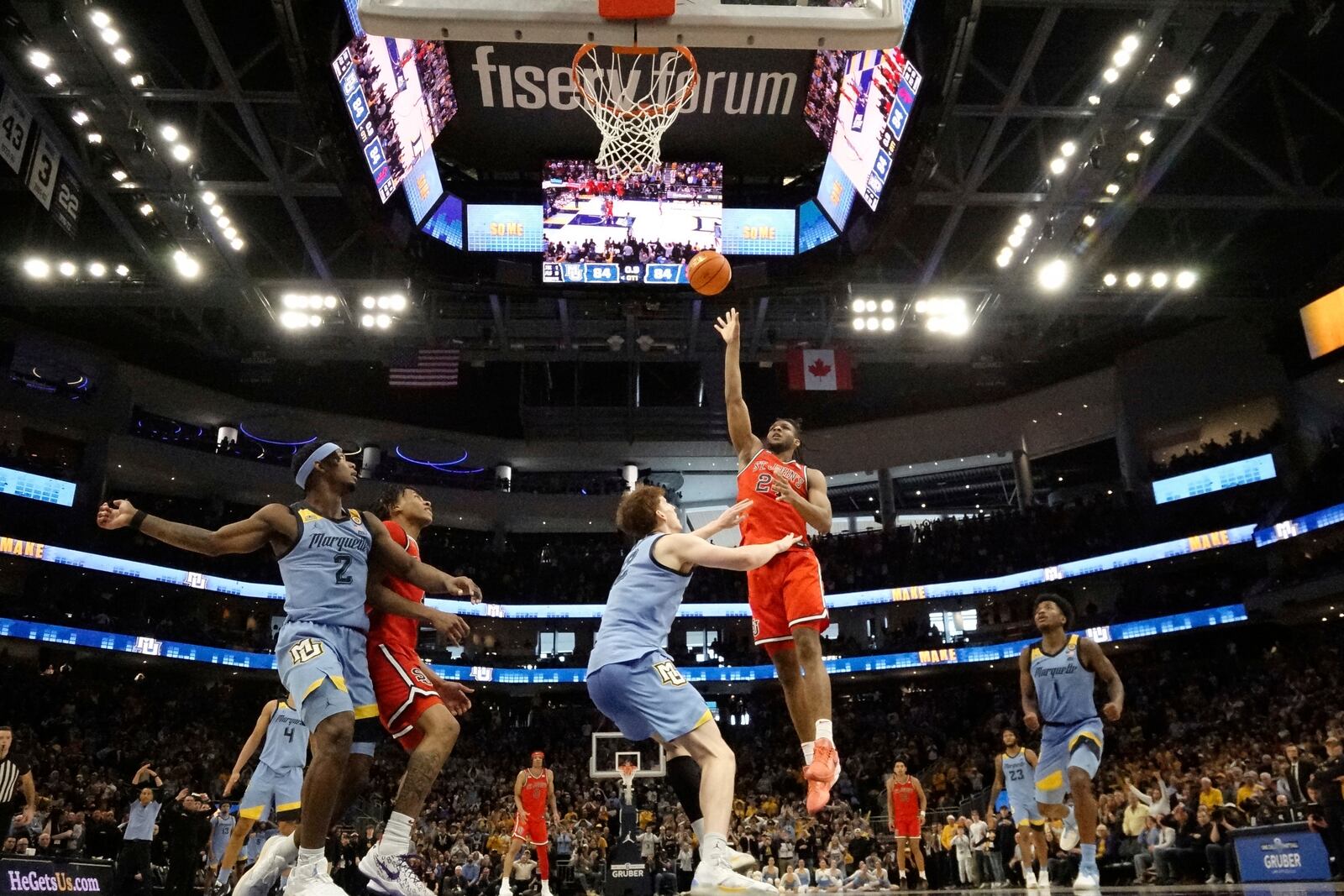 St. John's's Zuby Ejiofor makes the game-winning shot in overtime of an NCAA college basketball game against Marquette Saturday, March 8, 2025, in Milwaukee. (AP Photo/Morry Gash)