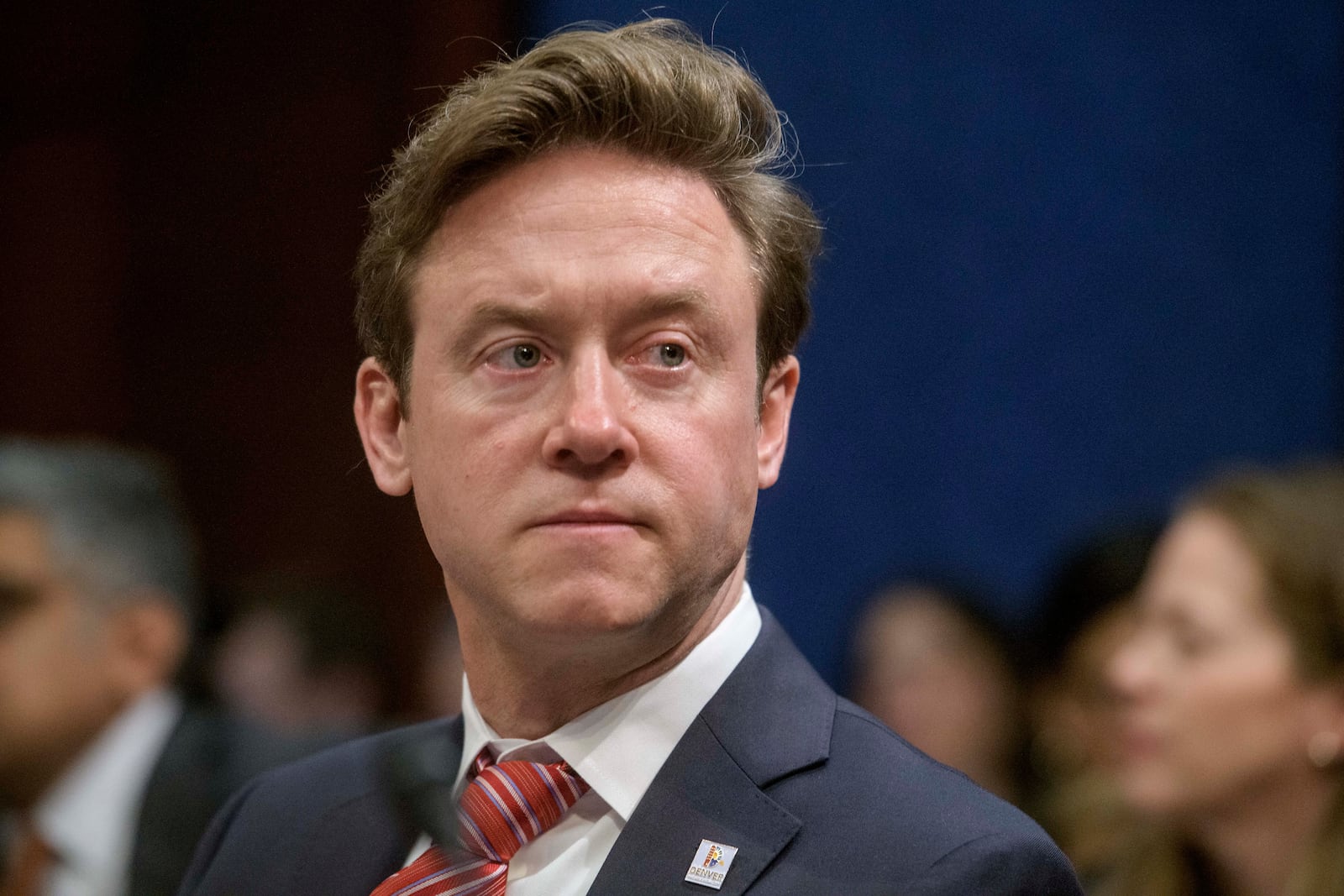 Denver Mayor Mike Johnston takes his seat at the witness table during a House Committee on Oversight and Government Reform hearing with Sanctuary City Mayors on Capitol Hill, Wednesday, March 5, 2025, in Washington. (AP Photo/Rod Lamkey, Jr.)