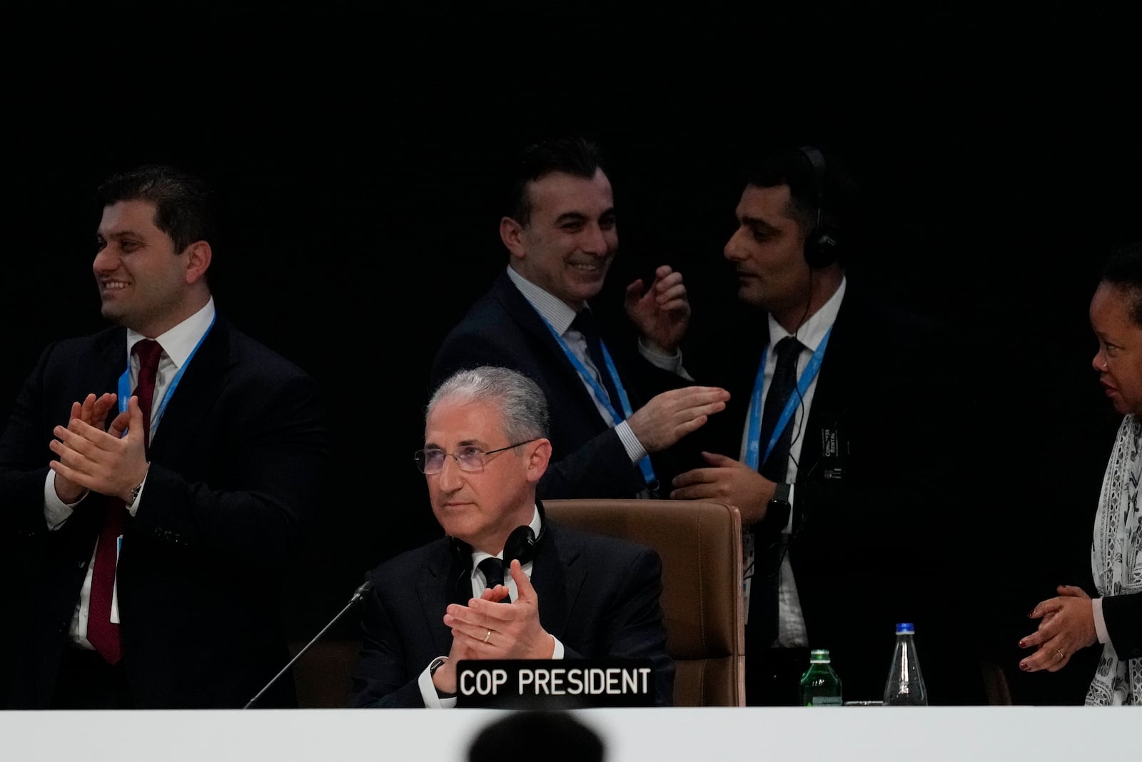 Mukhtar Babayev, COP29 President, applauds as he attends a closing plenary at the COP29 U.N. Climate Summit, Sunday, Nov. 24, 2024, in Baku, Azerbaijan. (AP Photo/Rafiq Maqbool)