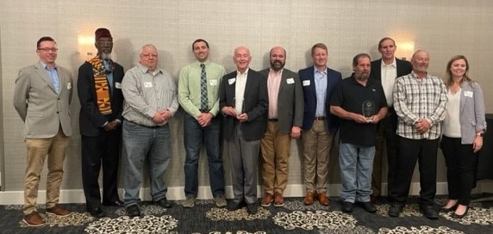 Members of the Montgomery County team responsible for the award-winning Third Street bridge project pose for a photo at the Montgomery Inn. Pictured from left to right are David Shields, Bing Davis, Brian Snyder, Joseph Dura, Paul Gruner, Sean Wade, Brady Bates, Scott Brown, Richard “Rock” Frantz, John Knoff and Rachel Bates. Photo courtesy the Montgomery County Engineer's Office.