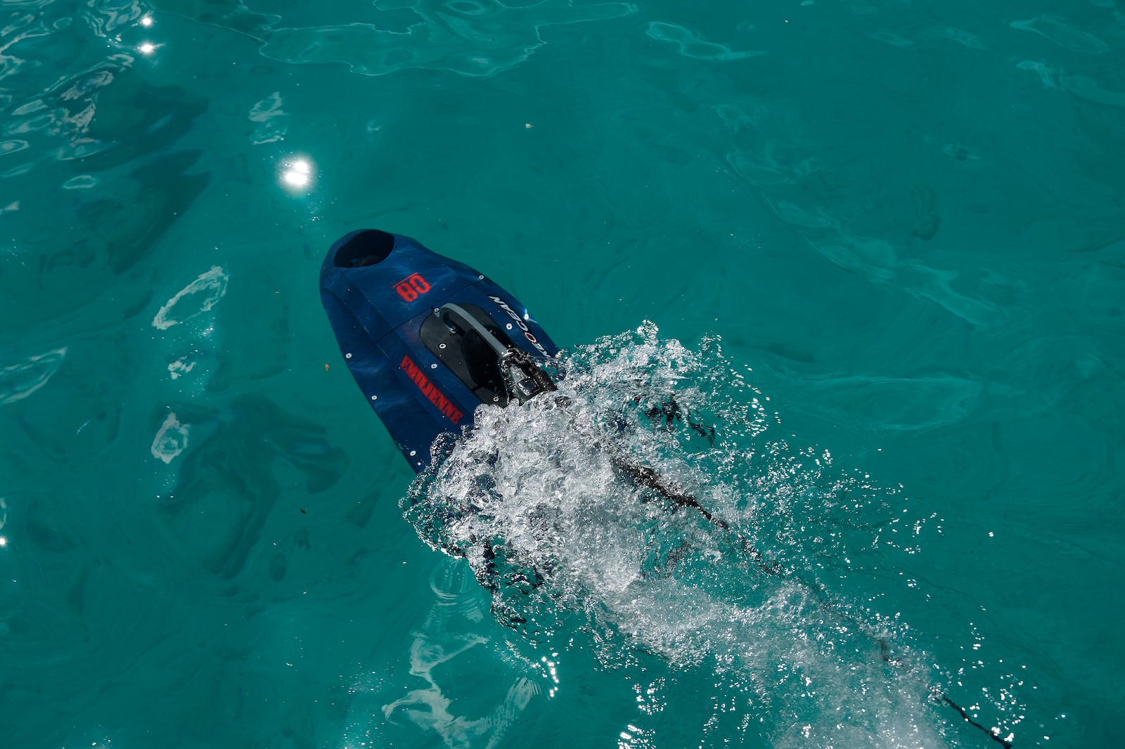 An underwater drone passes inside the seawater during a demonstration at a Marina in the southern resort of Ayia Napa, Cyprus, Monday, Feb. 24, 2025. (AP Photo/Petros Karadjias)