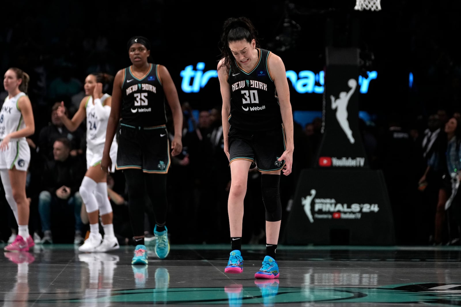 New York Liberty's Breanna Stewart (30) reacts after missing a free throw during the second half in Game 1 of a WNBA basketball final playoff series against the Minnesota Lynx, Thursday, Oct. 10, 2024, in New York. (AP Photo/Pamela Smith)