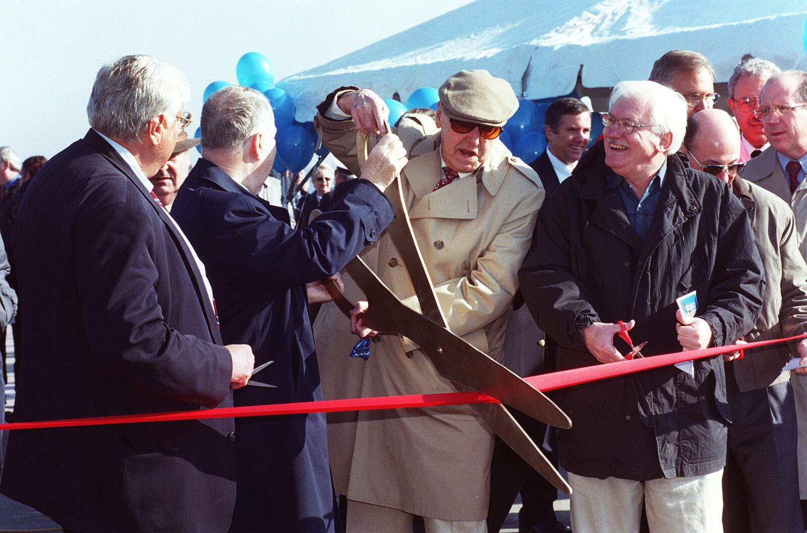 Greg Lynch/Journal-News
Butler County Commisioner Mike Fox, Vice Chairman, Butler County TID Jim Blount, Fairfield delagate to the TID board, Wendell Judd, and Fairfield Mayor Robert Wolpert along with others, cuts the ribbon marking the opening of the new Union Centre Blvd. extention.