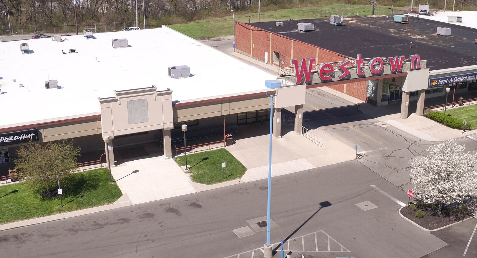 Former Aldi location in the Westown Shopping Center.  Ten years after the only Kroger on the west side of Dayton closed, beginning the onset of a food desert for people living here, the Aldi in the Westown Shopping Center closed its doors in April.     TY GREENLEES / STAFF