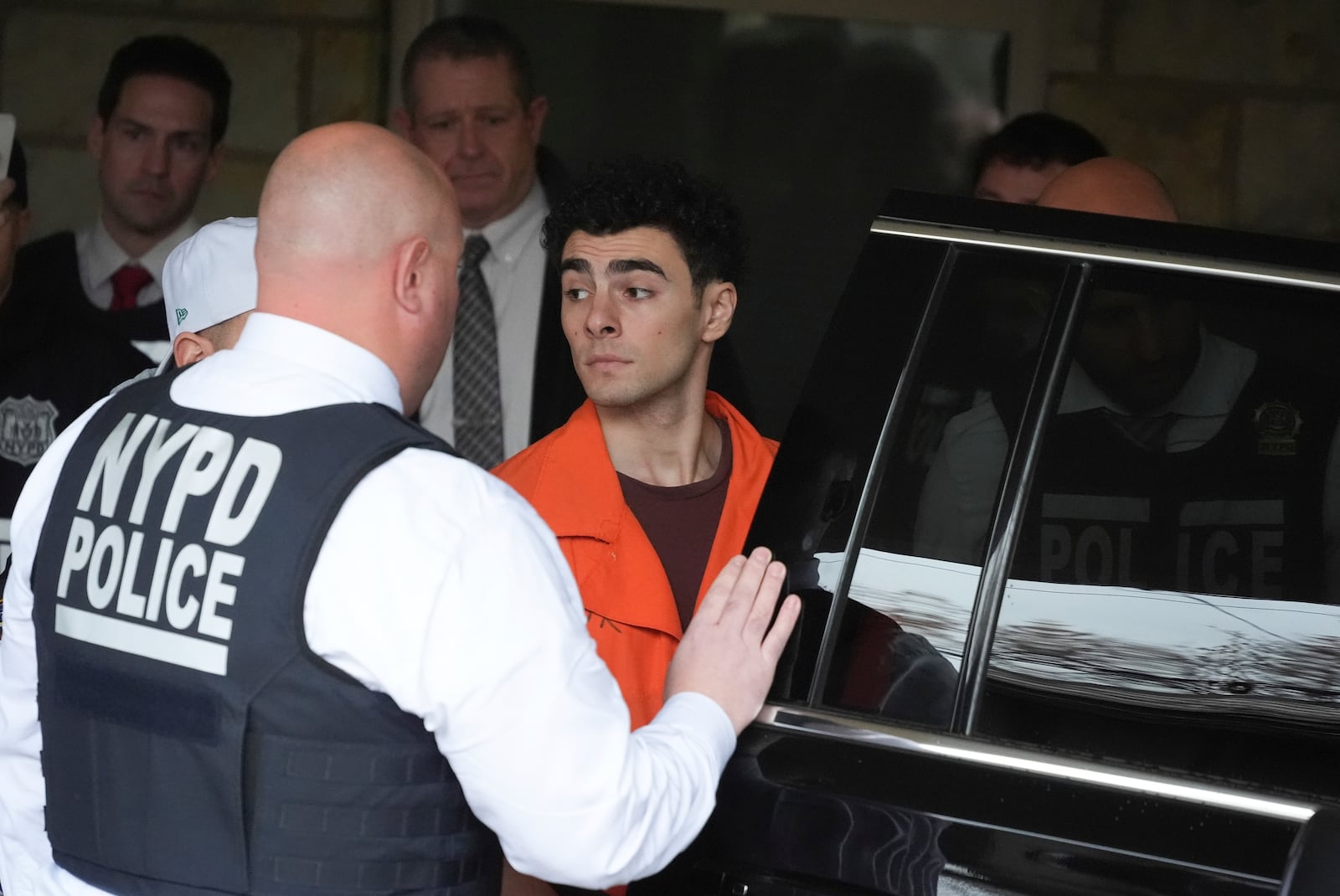 Luigi Nicholas Mangione leaves at Blair County Courthouse in Hollidaysburg, Pa., Thursday, Dec. 19, 2024. (AP Photo/Gene J. Puskar, Pool)