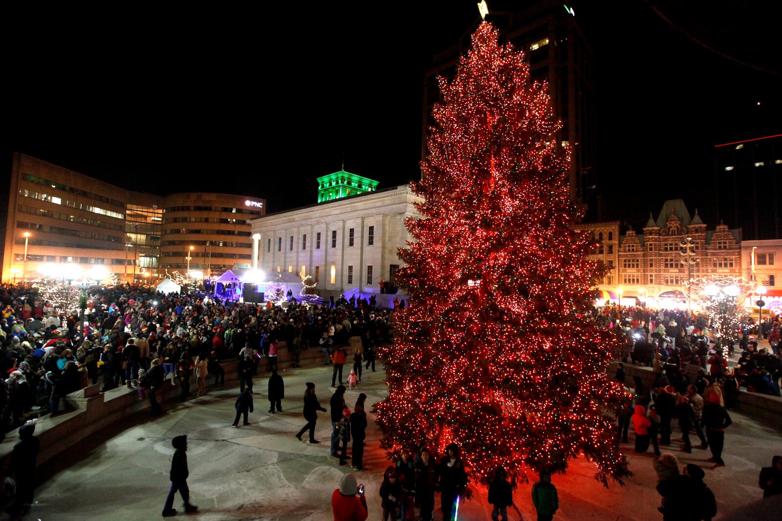 The Dayton Holiday Festival drew crowds of people to downtown Dayton Friday night. The Grand Illumination and the Dayton Children's Parade were two of the highlights of the annual event. The festivities also included live musical performances, horse drawn wagon rides and carnival rides for children. 
LISA POWELL / STAFF