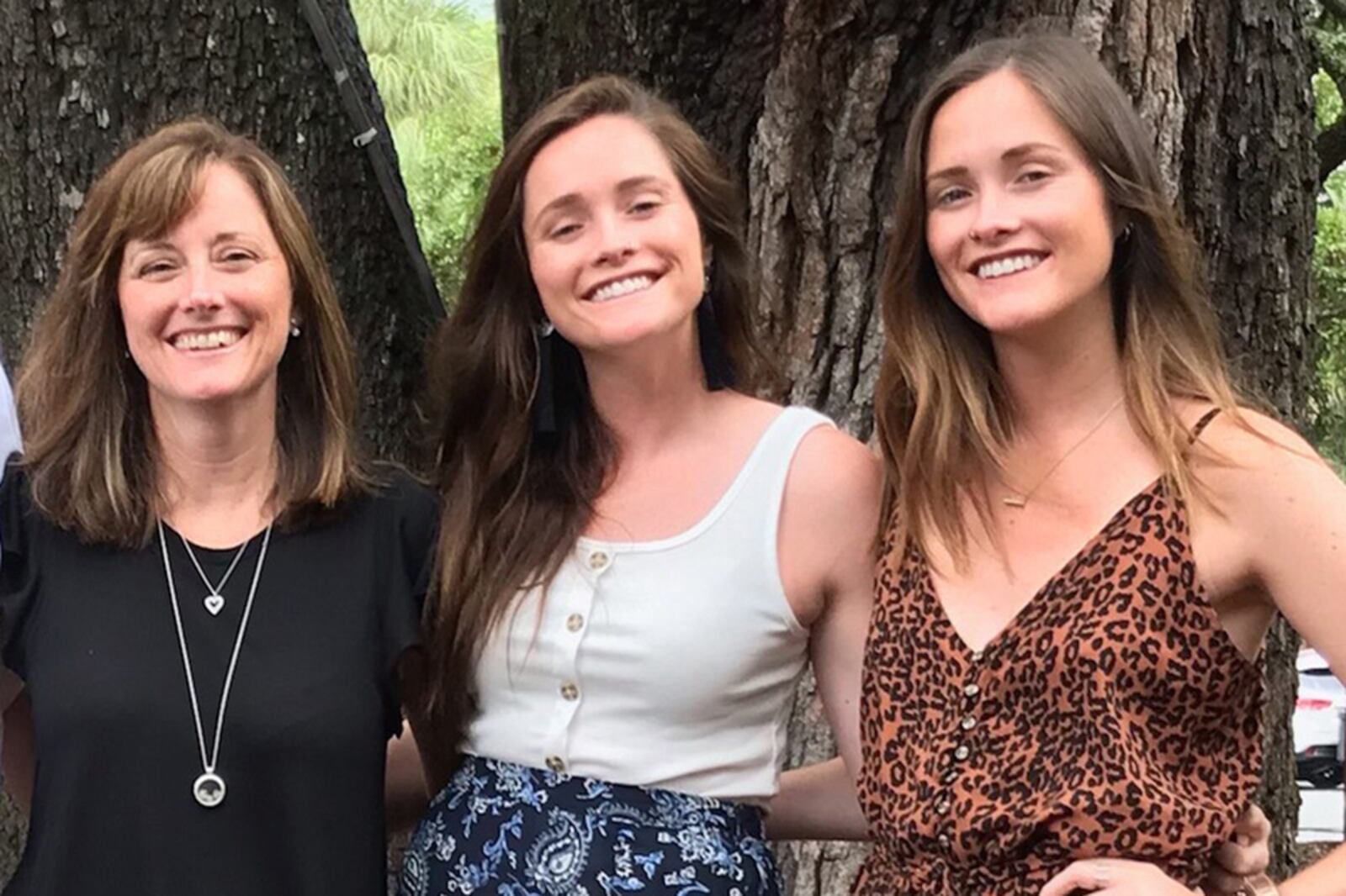 Traci Hale (Left) is shown with her twin adult daughters, Haley (center) and Kinsey Brown. All three are involved in a nationwide movement to make homemade lasagna meals and deliver them to families in need (Lasagna Love)