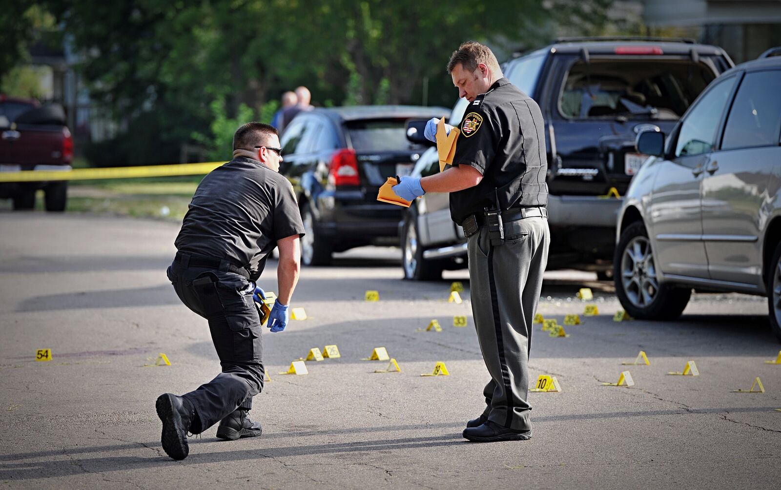 A man was fatally shot and multiple houses and vehicles were hit by gunfire Friday morning, July 17, 2020, in the 200 block of Fer Don Road in Harrison Twp. Montgomery County Sheriff's investigators found more than 20 shell casings following the shooting. MARSHALL GORBY/STAFF