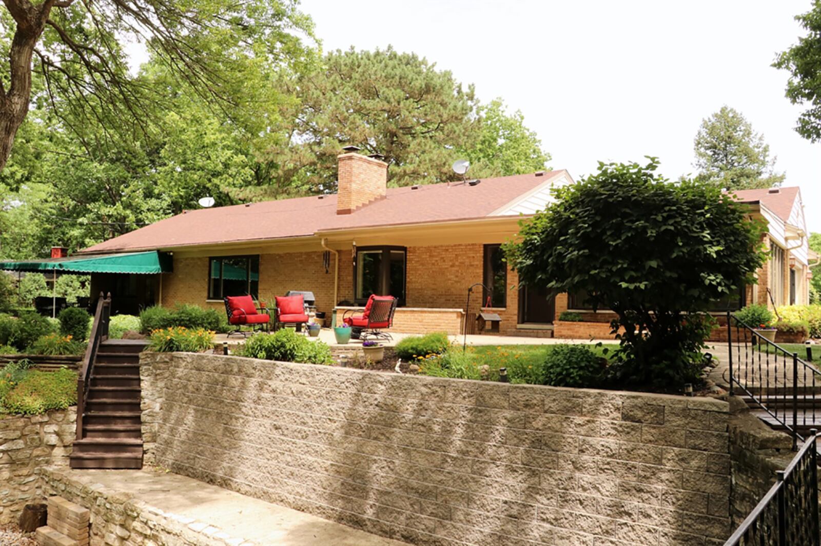 Eleven windows and a glass door provide panoramic views of the yard. The sun room has a ceramic-tile floor, bead-board ceiling with paddle fan and a built-in bookcase and cabinet. There is baseboard heat for winter use. CONTRIBUTED PHOTO BY KATHY TYLER