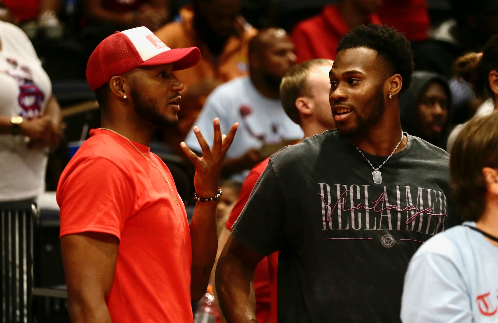 Chris Wright and Richard Amaefule talk behind the Red Scare bench during The Basketball Tournament on Wednesday, July 27, 2022, at UD Arena in Dayton. David Jablonski/Staff