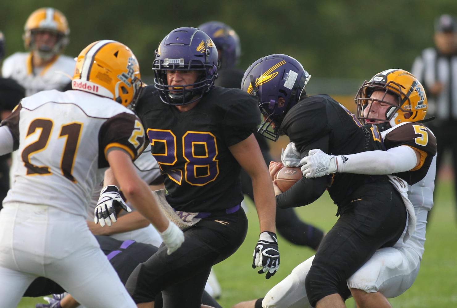 Photos: Mechanicsburg beats Kenton Ridge 27-3 in Week 1