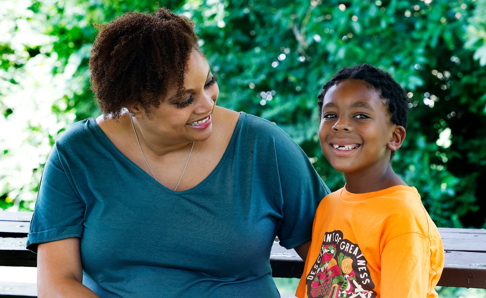 Amir Anderson with his mother Raya at Hintermeister Park.  Amir has struggled with multiple mental health problems since birth. MARSHALL GORBY\STAFF