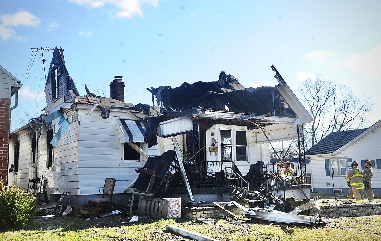 A Dayton Fire Department firefighter was injured during a house fire Wednesday morning near Shoop Avenue and Edison Street Wednesday Nov. 30, 2022. MARSHALL GORBY \STAFF