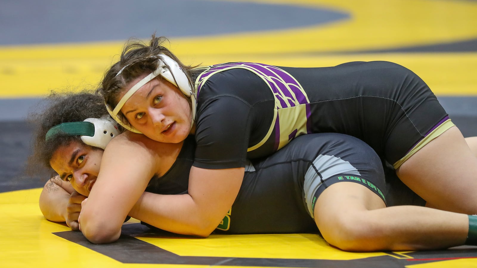 Eaton High School's Caroline Klawon (top) holds her opponent during a match at the Ohio High School Athletic Association's state wrestling championships on Friday, March 7 at the Schottenstein Center in Columbus. Dave Thompson/CONTRIBUTED