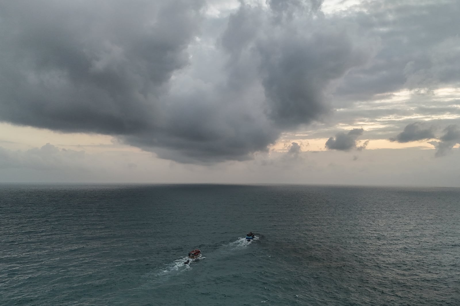 Boats transport migrants from the Caribbean coast village of Miramar, Panama for the Colombian border, Thursday, Feb. 27, 2025, as migrants return from southern Mexico after abandoning hopes of reaching the U.S. in a reverse flow triggered by the Trump administration's immigration crackdown. (AP Photo/Matias Delacroix)