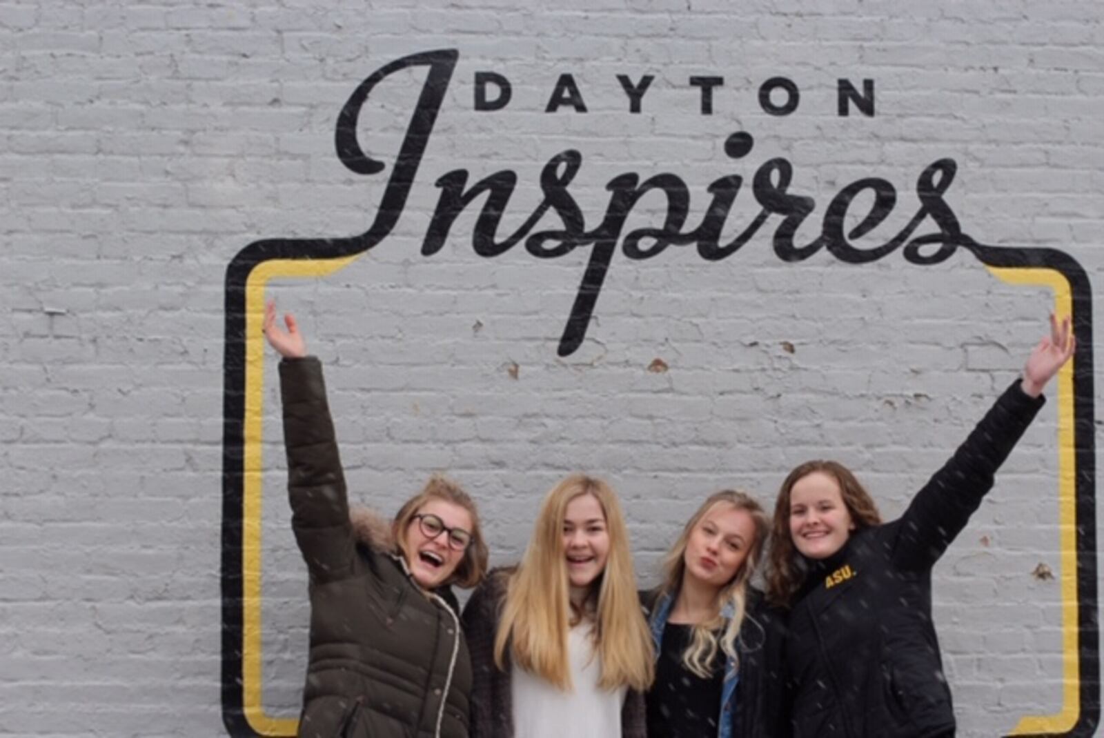 Oakwood High School sophomores ( left to right)   Ryann Mescher, Dana Clark , Zoe Waller and  Claire Parker launched the Femme Aid Collaborative to  address period poverty in the Dayton area. They are pictured in the Oregon District.