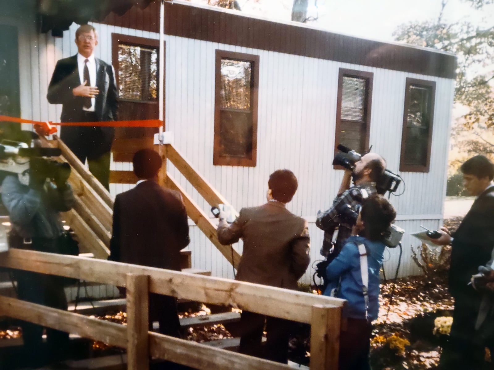 Humphries hosted open houses and press conferences as 10 Wilmington Place was set to open to accept residents. He is shown in an early open house/press conference in 1986.